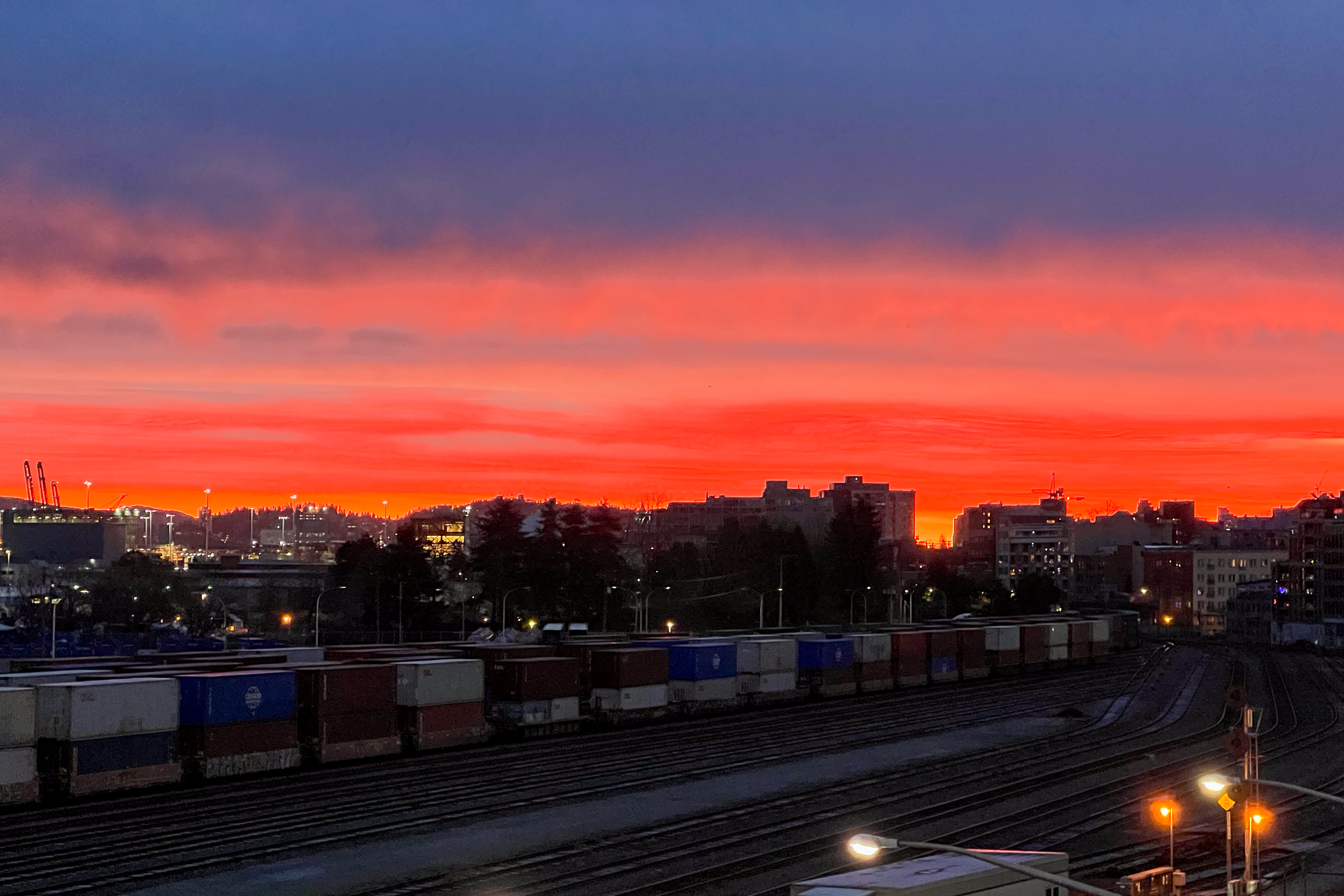 sunrise over railroad tracks